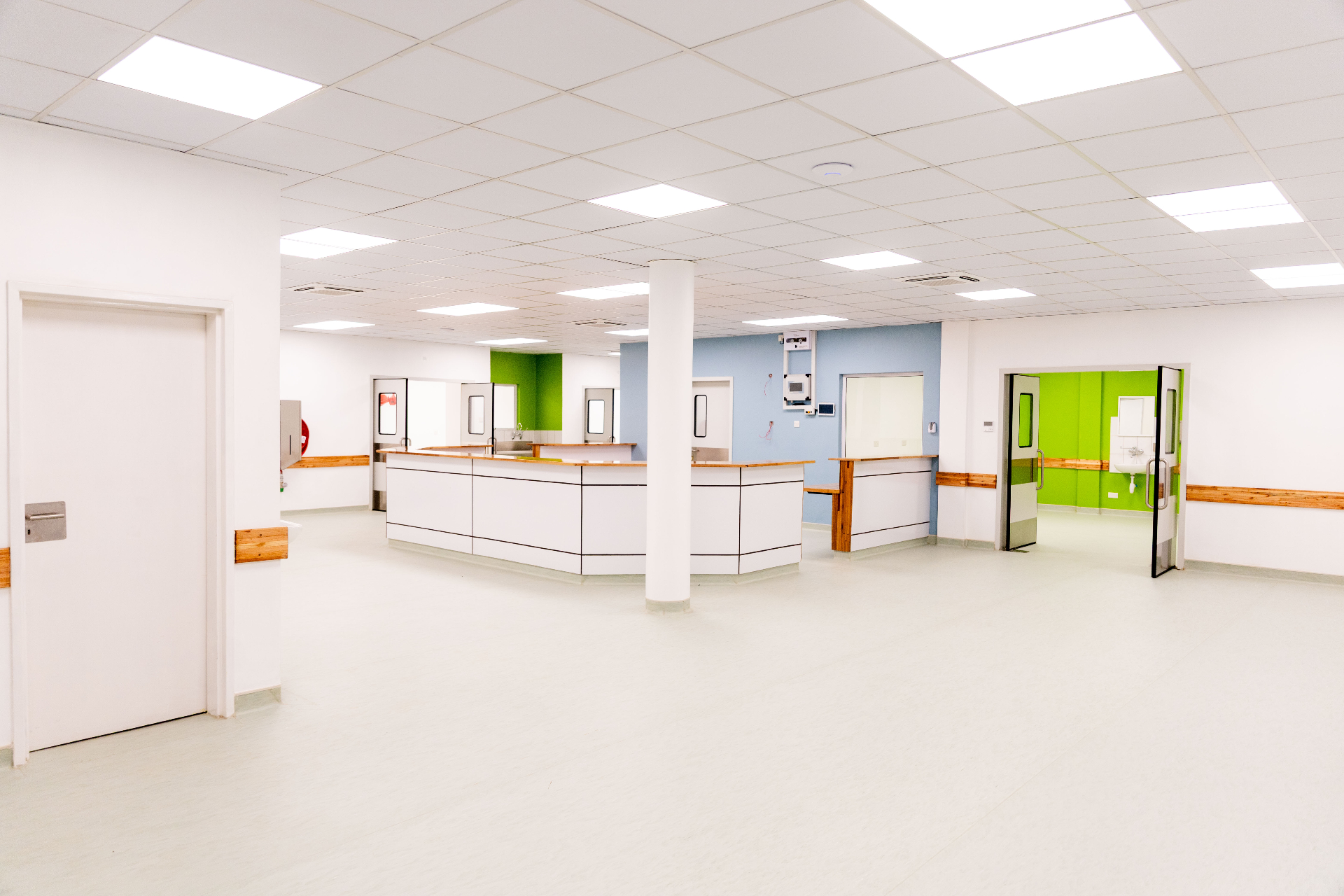 CURE Malawi nurses station with blue and green accent walls