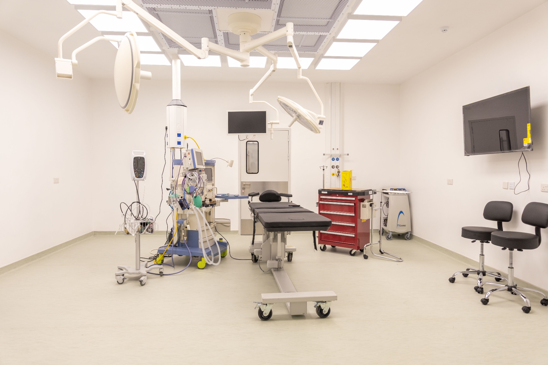 CURE Malawi operating theatre with surgical lights and anesthesia equipment