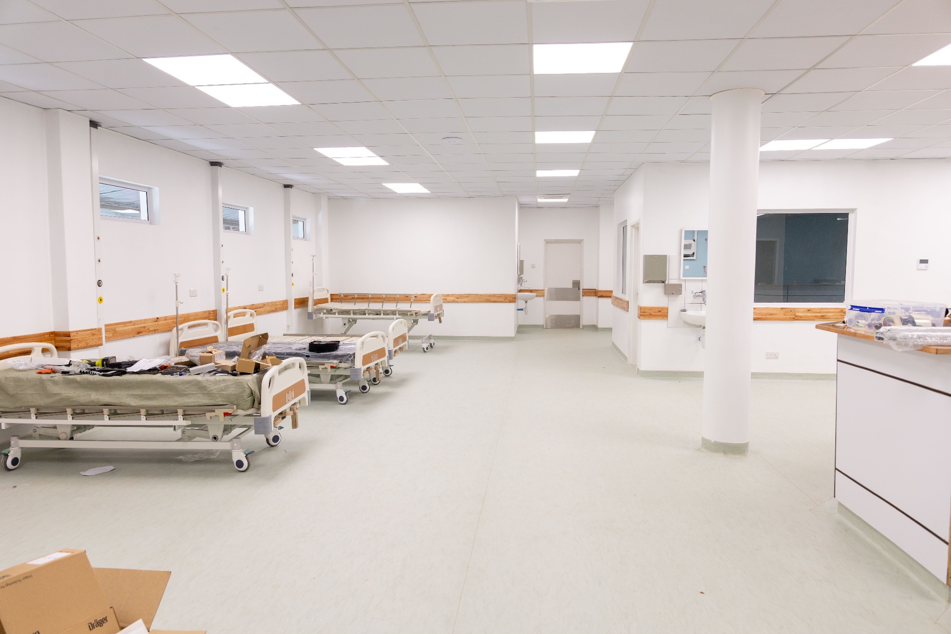 CURE Malawi pre-op room with empty hospital beds